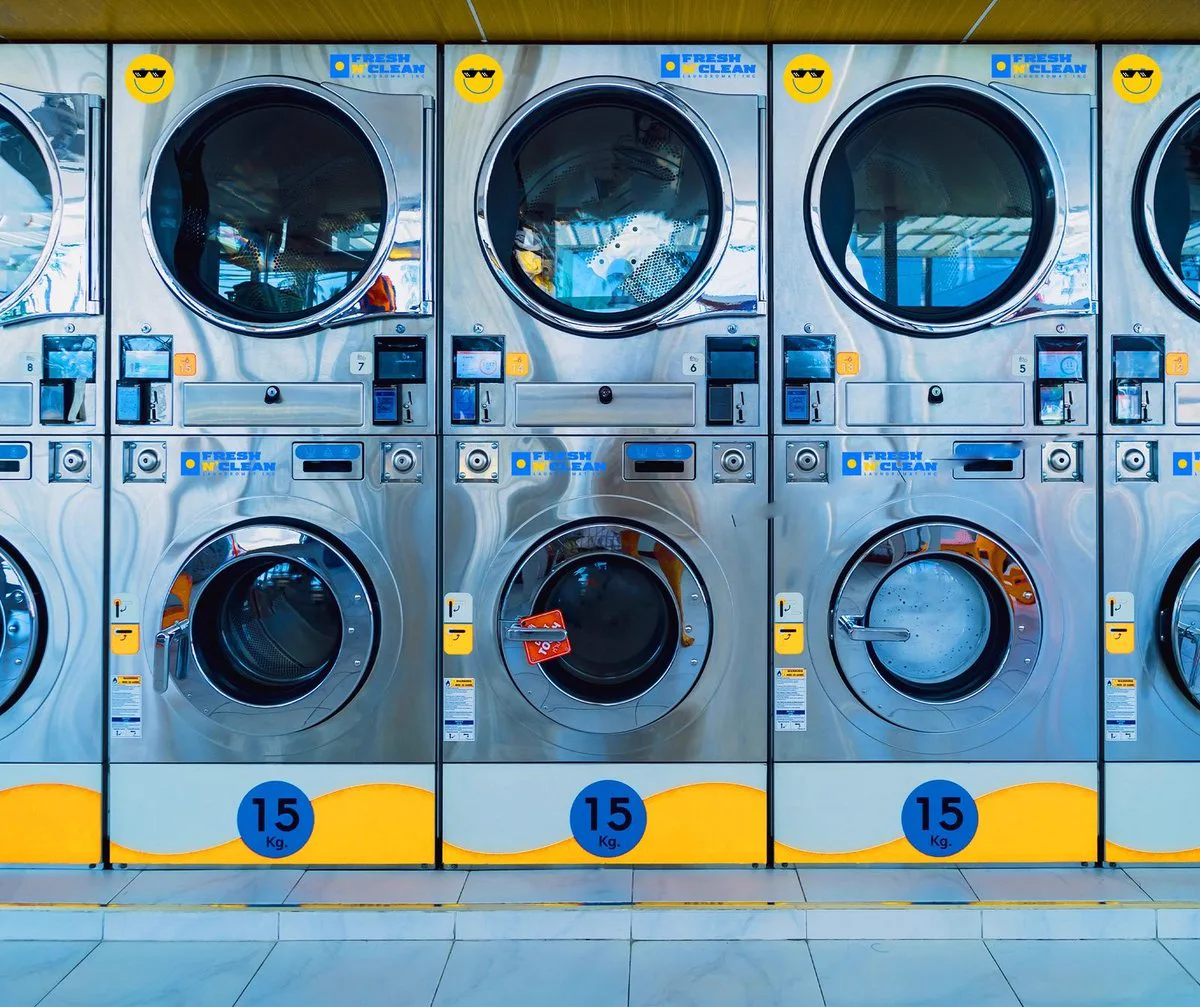 Row of Fresh N' Clean washing machines